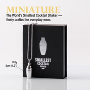 Miniature cocktail shaker necklace in front of a black gift box with the name "Smallest Cocktail Shaker Ever"